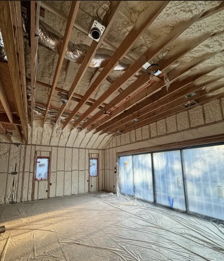 Interior walls and ceiling insulated with spray foam during new construction in Thomson